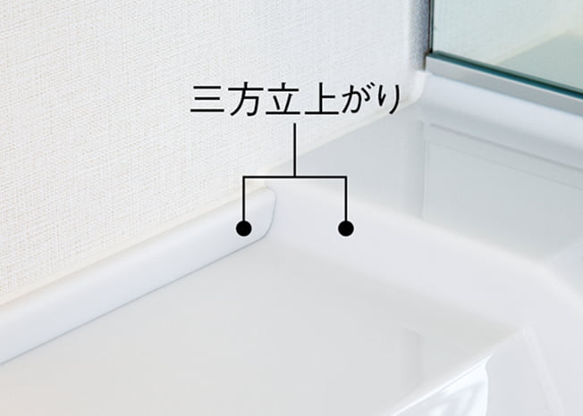 カウンター三方立上がりの角の写真